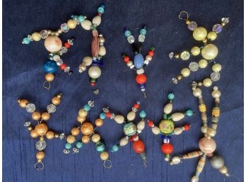 A Whole Bone Of Vintage Little Beaded People Ornaments
