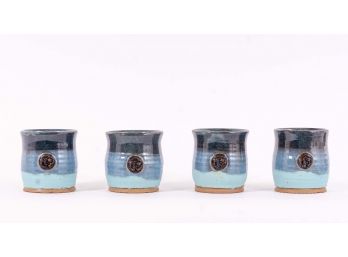 Set Of Four Blue Glazed Pottery Cups