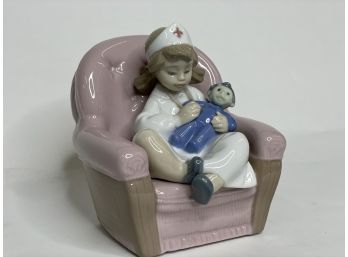 Nao Handmade In Spain By Lladro. Girl Playing Nurse Holding Doll Porcelain Figurine