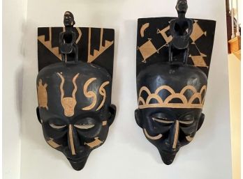 Pair Of 20' H Decorative Black & Gold African Masks