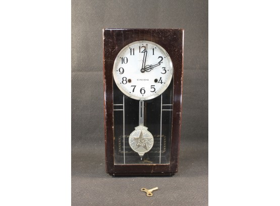 Eikeisha Contemporary Styled Wood & Glass Wall Clock With Pendulum & Key