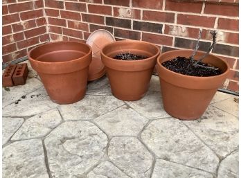 3 Terra-cotta Planters