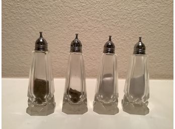2 Pair Of Glass Salt And Pepper Shakers With Metal Tops. Almost 5 Inches Tall.