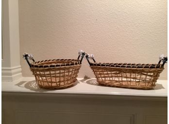 Two Wicker Baskets With Blue And White Ceramic Handles