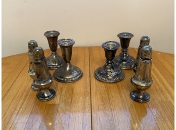 Sterling Silver Weighted Group. (2) Pair Salt & Pepper Shakers (2) Pair) Candlestick Holders