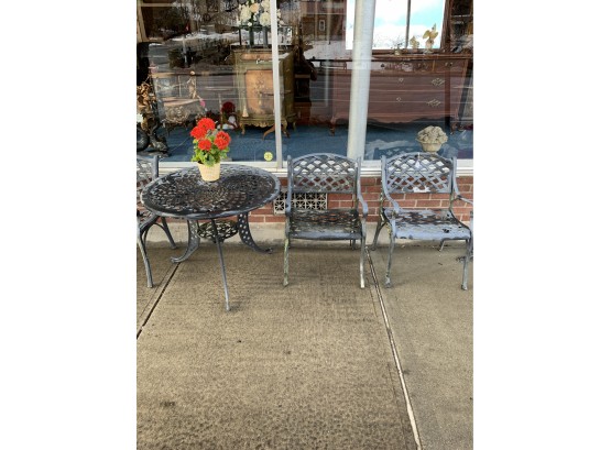 Cast Aluminum Outside Table And Chairs.