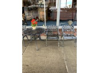 Cast Aluminum Outside Table And Chairs.