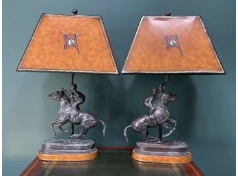 A Pair Of Vintage Bronze Jockey Lamps With Leather Shades