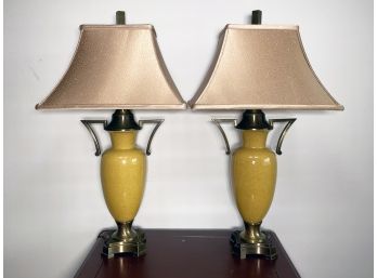 A Vintage Brass And Ceramic Decorative Lamp Pairing