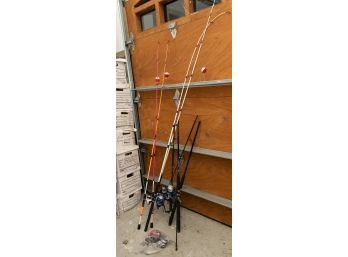 Collection Of Fishing Poles And Gear