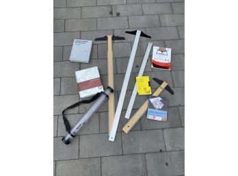 Bundle Of Drafting Rulers And Architectural Design Books