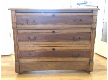 Vintage Wood Chest Of Drawers With Brass Pulls And Casters