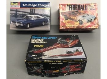 Lot Of Three Vintage Model Car Sets-Fireball, 69 Dodge Charger, And Super Sno-sport!
