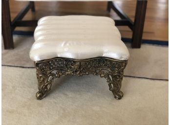 Upholstered Footstool With Heavy Metal Base