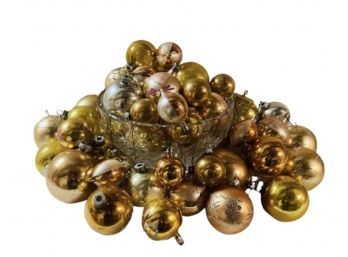Gold Christmas Balls In A Glass Bowl