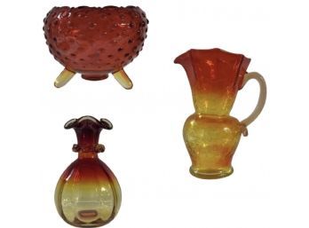 Three Pieces Of Amberina Glass