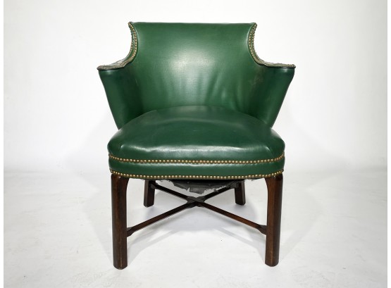 A Vintage Bankers Chair In Green Leather With Nailhead Trim