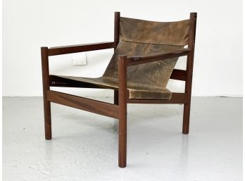 A Vintage Mid Century Teak And Leather Arm Chair