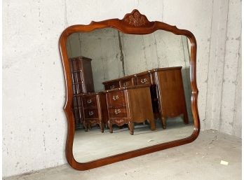 A Large Mirror By Bassett Furniture