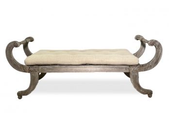 A Weathered Teak Bench With Tufted Linen Cushion