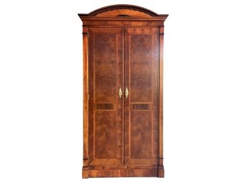 A Large Hardwood Wardrobe Cabinet By Century Furniture