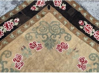 An Antique Floral Hooked Rug