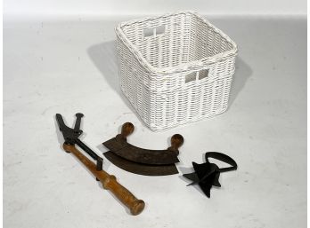 A Basket And Primitive Metal Tools