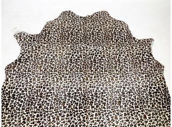A Large Vintage Leopard Print Cowhide Rug