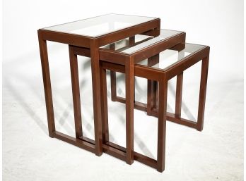 A Set Of 3 Mid Century Modern Mahogany Glass Top Nesting Tables