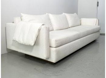 A Stunning Modern Sofa In Woven White
