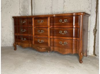 A French Provincial Style Dresser By Bassett Furniture