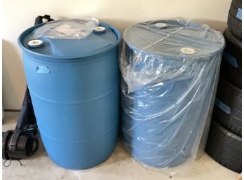 A Pair Of 55 Gallon Water Jugs