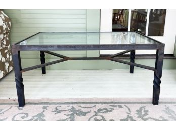 A Hand Forged Wrought Iron And Glass Coffee Table