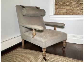 A Linen Armchair With Leather Strapped Headrest By Restoration Hardware