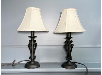 A Pair Of Bronze Tone Accent Lamps