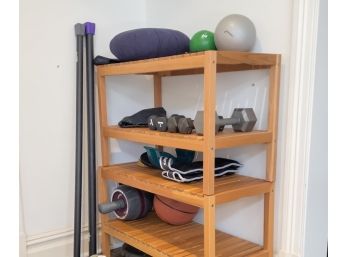 A Bamboo Rack And Assorted Gym Accessories