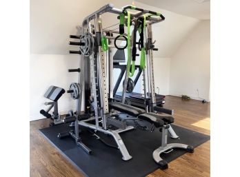 A TuffStuff Pro Weight Bench And Accessories (See NOTE)
