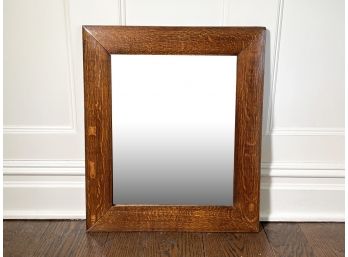 An Antique Oak Mirror