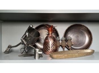 A Collection Of Mixed Metal Decor