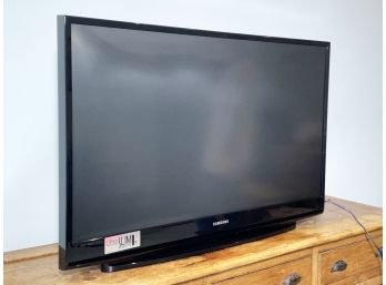 A Large UltraSlim DLP TV By Samsung
