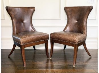 A Pair Of Leather Chairs By Restoration Hardware