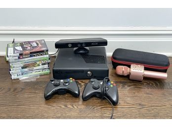 An XBox 360, Microphone, And Various Games
