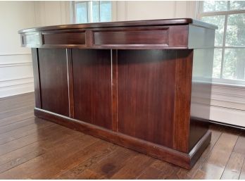 A Luxurious Bar With Mahogany And Granite Finishes By Bernhardt Furniture