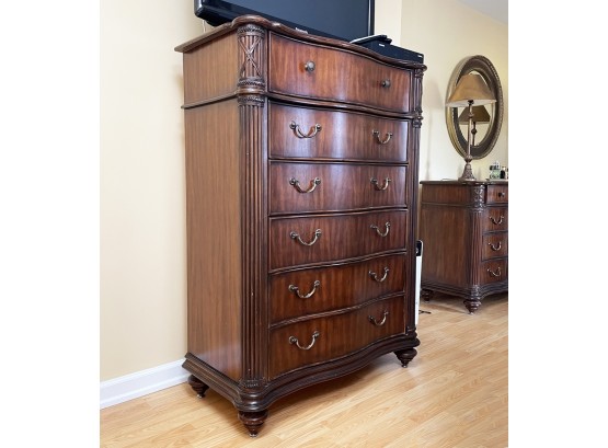 A Leather Top Chest Of Drawers