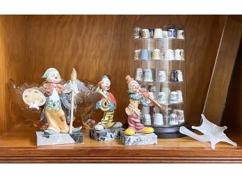 A Vintage Ceramic Clown And Thimble Collection