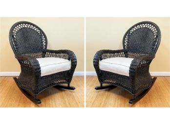 A Pair Of Wicker Rocking Chairs