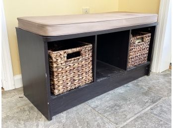 A Storage Bench With Top Cushion