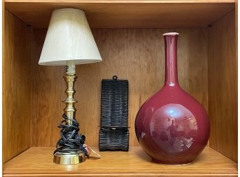 A Stick Lamp And Decor Assortment