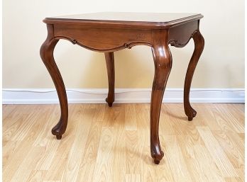 A Hardwood End Table By The Bombay Company