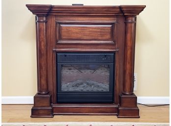 A Faux Fireplace Electric Heating Unit